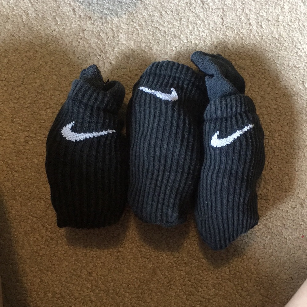3 pairs of long black Nike socks (all together)